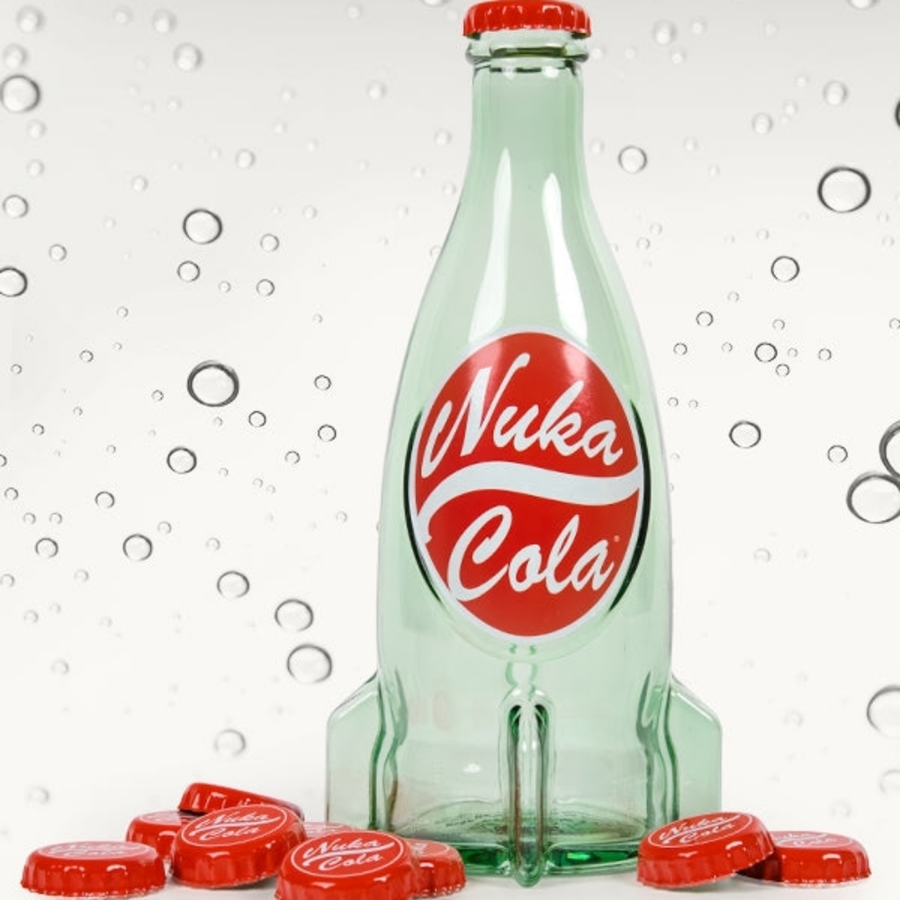 Fallout Nuka Cola Glass Bottle + 10 Bottle Caps Tin Rocket Statue